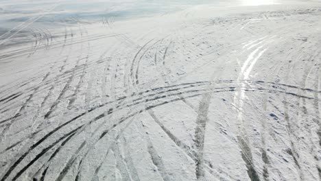 Pilot-drivers-having-fun-and-drifting-on-a-frozen-lake