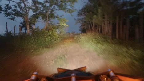 FPV-view-of-a-Can-am-driving-at-high-speed-at-night-in-a-rural-zone-in-a-mountain-of-the-dominican-republic
