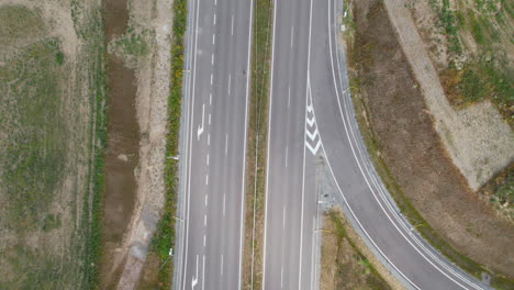 Aerial-shot-of-an-empty-highway,-no-cars,-looking-down,-birds-eye-view
