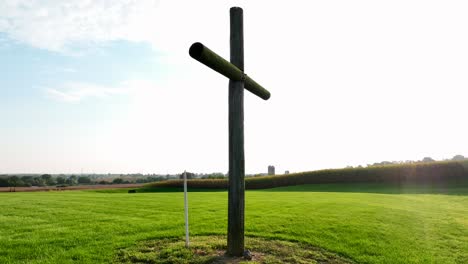 Cross-in-rural-countryside-representing-Jesus-crucifixion-and-death,-resurrection