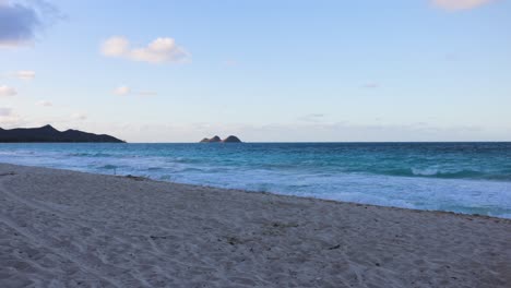 A-time-lapse-of-wide-and-deserted-idyllic-sand-at-Sherwood-beach-on-the-east-coast-of-Oahu-in-Hawaii-in-winter