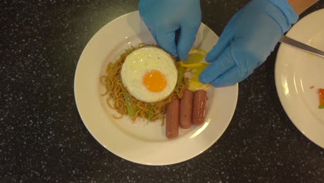 Chinese-continental-food-buffet-oriental-grill-noodle-served-on-a-plate-with-egg-and-garnished