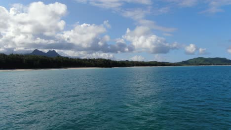 Sandy-beaches,-jungle-forests,-and-the-most-spectacular-crystal-blue-waters-of-Waimanalo-Bay,-a-hidden-gem-in-OAHU,-Hawaii