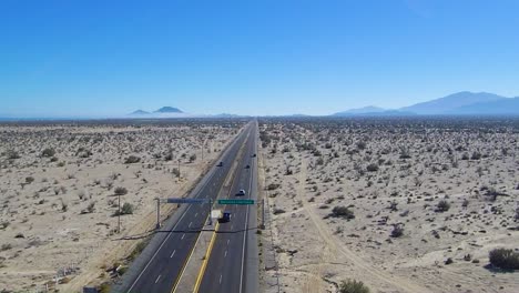 View-of-a-drone-ascending-beside-a-highway