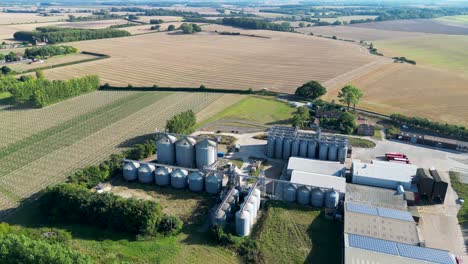 Aerial-footage-of-an-industrial-plant-with-large-silos