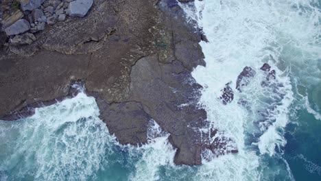 Drone-capture-the-Cantabrian-sea-and-the-shore-of-the-island-of-Isla-from-a-great-height