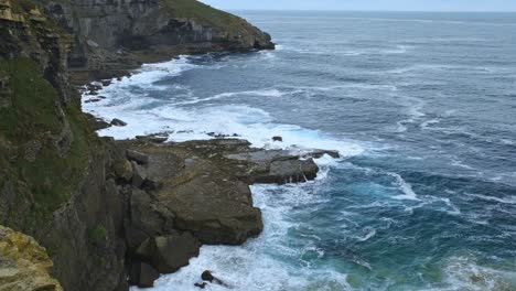 From-the-edge-of-the-rocky-broken-edge-of-Isla-Cantabrian-sea-can-be-seen-on-a-sunny-day