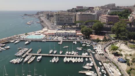 Aerial-view-around-boats-at-the-Porticciolo-Molosiglio-Marina,-in-Naples,-Italy---orbit,-drone-shot
