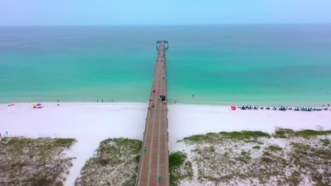 Drone-flying-down-the-center-of-the-Navarre-Beach-Florida-Pier