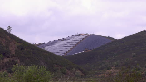 A-large-mountain-completely-covered-with-solar-panels-for-sustainable-energy