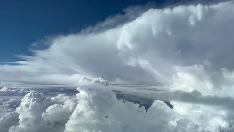 Impressive-view-of-a-threatening-cumulonimbus-ahead-in-the-route-of-a-jet-flting-at-12000-metres-high