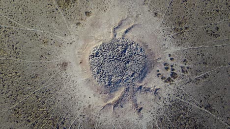 Aerial-view-of-a-dry-waterhole-with-game-trails-in-the-arid-kalahari-region-of-southern-Africa-1