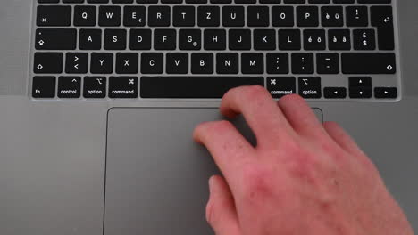 A-laptop-user-is-typing-on-letters-to-write-a-text,-online-message-on-a-computer