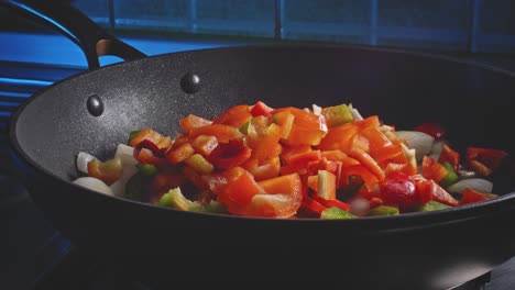 Sauteing-Fresh-Onions-And-Bell-Pepper-In-A-Pan
