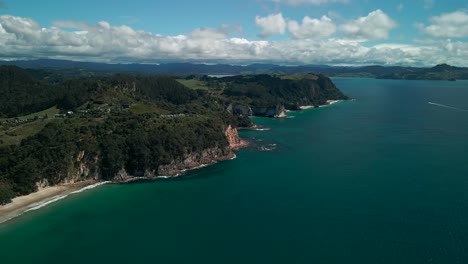 Flying-drone-towards-Cathedral-Cove,-Coromandel-Peninsula---New-Zealand's-North-Island