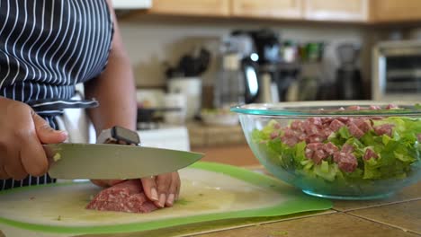 Dicing-salami-to-add-protein-to-the-chopped-salad---ANTIPASTO-SALAD-SERIES