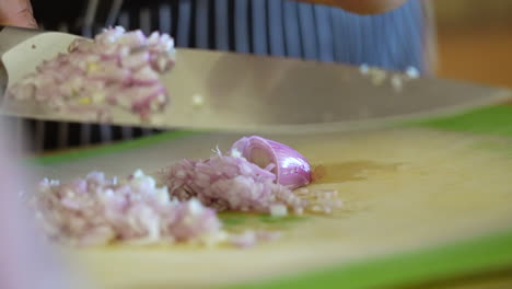 Chopping-shallots-for-salad-dressing-recipe-to-add-to-a-chopped-salad---ANTIPASTO-SALAD-SERIES
