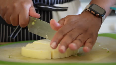 Slicing-a-white-mild-cheese-for-a-chopped-salad---ANTIPASTO-SALAD-SERIES