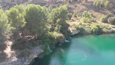 Small-waterfalls-in-Lagunas-de-Ruidera-in-sunny-day,-Spain