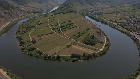 Rotating-Aerial-Shot-Around-The-Bremm-Moselle-Loop-And-Vast-Vineyards