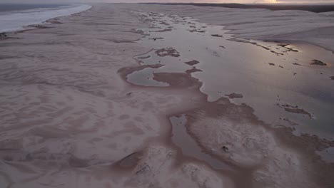 Lagoons-In-Stockton-Sand-Dune-During-Dusk-Near-Hunter-River-In-New-South-Wales,-Australia