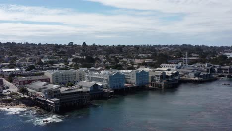 Aerial-close-up-dolly-shot-of-historic-Cannery-Row-in-Monterey,-California