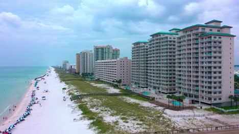 Aerial-drone-view-flying-towards-the-resorts-on-Navarre-Beach-Florida