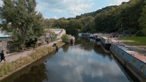 Aerial-footage-of-a-Canal-with-anglers-fishing-For-Roach-and-Bream