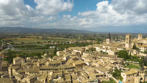 Drone-Flies-Above-Spello,-Italy-on-Classic-Summer-Day