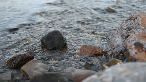 Flowing-Water-From-Creek-Past-Rocks.-Close-up