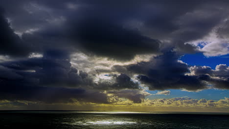 Static-shot-of-dark-cloud-movement-in-timelapse-over-sea-at-daytime