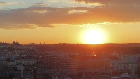 Drone-Flight-Skyline-of-Prague-at-sunset,-industrial-style,-prague-castle