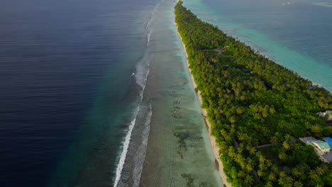 Aerial-View-Of-Tranquil-Coastline-Of-Dhigurah-Island-In-The-Maldives