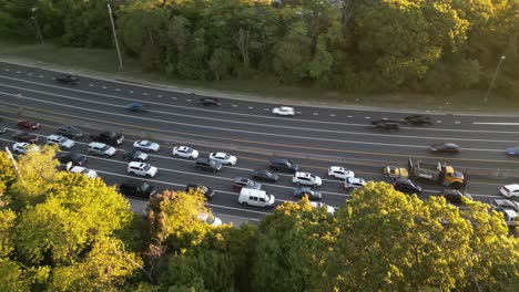 An-aerial-view-of-the-Southern-State-Parkway-on-Long-Island,-NY-after-sunrise