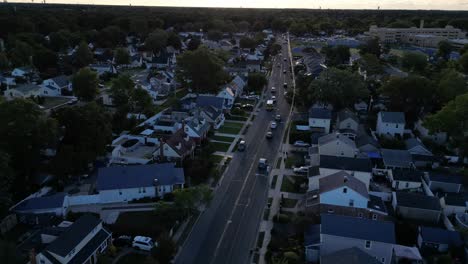 An-aerial-time-lapse-over-a-residential-neighborhood-on-Long-Island,-NY