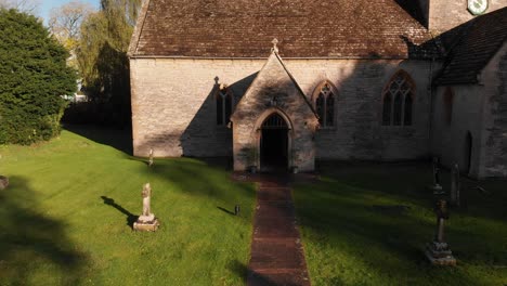 Aerial-drone-shot-of-Butleigh-church-near-Glastonbury,-Somerset