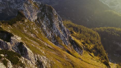 Forward-movement-with-a-drone-filmed-beautiful-mountains-in-the-alps-at-sunrise-with-a-clear-sky-in-4k-1