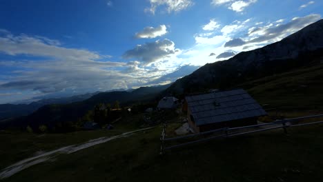 Fpv-footage-was-filmed-in-the-Slovenian-mountain-village-in-the-alps-with-a-drone-flying-fast-over-mountains-filmed-with-a-GoPro-with-surrounding-landscapes-flying-between-and-over-small-wooden-cabins-3
