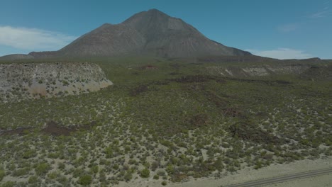 Tilt-up-Aerial-Reveal-of-Tres-Virgenes-Volcano-Mountain-in-Mexico