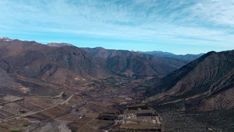 Panoramic-aerial-view-of-arid-mountains-of-northern-Chile-on-a-sunny-day