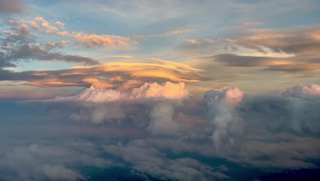 Amazing-view-of-a-sky-painted-with-pastel-colors-during-the-sunset,-recorded-from-a-jet-cockpit