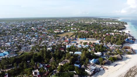 Drone-view-on-Nungwi-village,-Zanzibar-Island,-Tanzania,-Africa,-Indian-Ocean