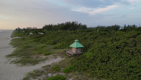 Aerial-View-of-Lifeguard-Tower-and-Sandy-Beach-of-Boca-Raton-City,-Florida-USA-at-Sunrise,-Drone-Shot