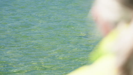 Tourists-On-Sightseeing-Boat-Watching-Wild-Sea-Turtle-Swim-In-Ocean,-4K-Slow-Motion