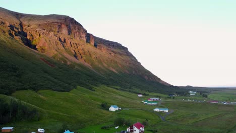 Midnight-sun-Iceland-blue-cottage,-village-in-scandinavia
