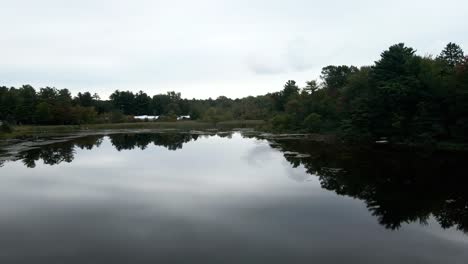Slow-approach-to-a-calm-and-cloudy-day-on-Little-Black-Lake