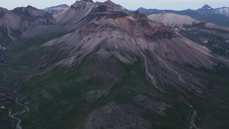 Reveal-shot-of-famous-hiking-mountain-Staðarfjall-in-Iceland-during-sunset,-aerial