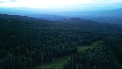 Sandia-Mountains-Range,-New-Mexico-USA,-Aerial-360-Degrees-Panorama-of-Landscape,-Forest,-Hills-and-Mist-Above-Valley