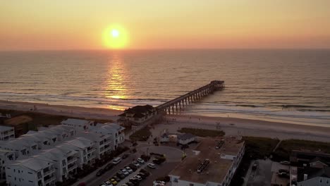 Aerial-pullout-over-pier-at-sunrise-at-wrightsville-beach-nc