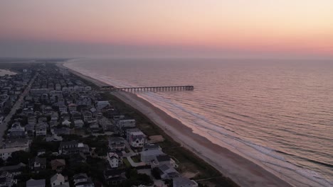 Sunrise-aerial-with-fishing-pier-in-background-Wrightsville-beach-nc,-north-carolina